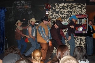 Video still of Alberta Beef Drag King Troupe performing cowboys